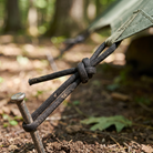Trailcord 550 Paracord tying down a tarp at camp