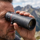 Vista HD Zoom Monocular in use scanning a vista