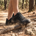 Bedrock Suede Trail Hiking Shoes worn on a forest trail